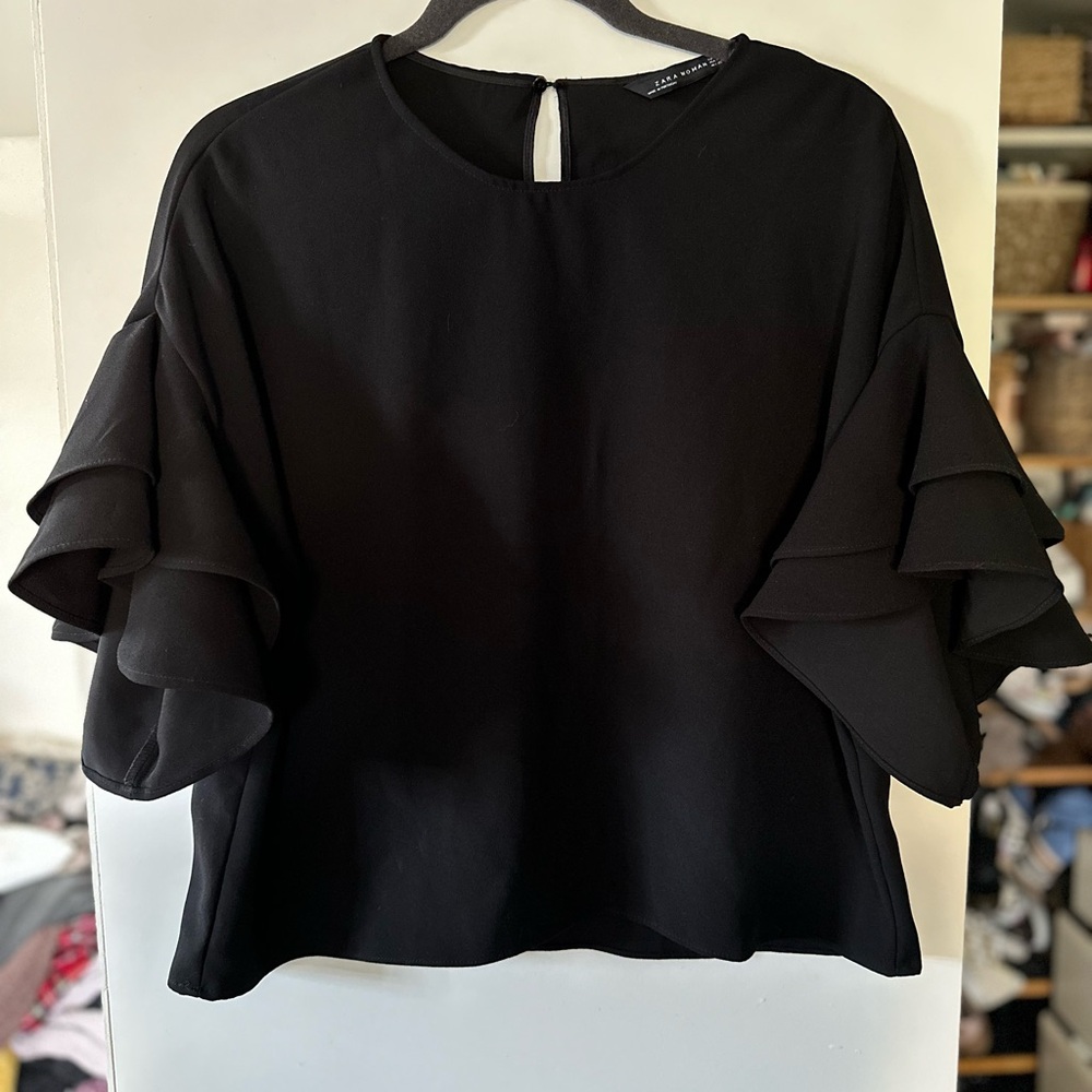 Zara woman black blouse ruffles on arm Medium Chest 44” L 22”